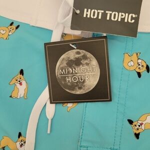 Hot Topic green dog print board shorts size 38
